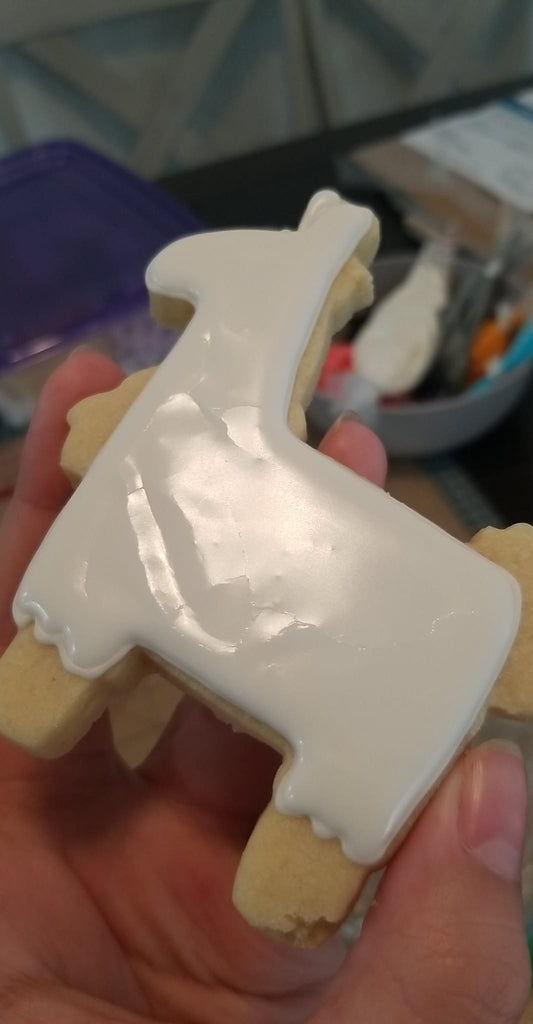 Sugar Cookie Royal Icing cracked has waves ripples indents